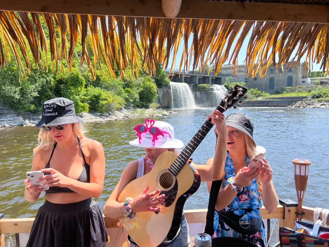 A bachelorette party with a guitar on board